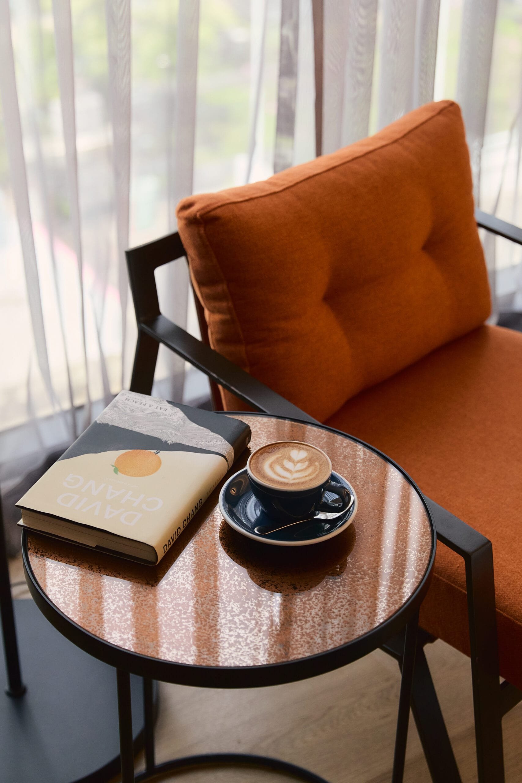 Public House Bangkok coffee on table and lounging chair